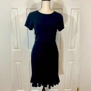 Alya little black dress Conservative cute with frill at hem. M